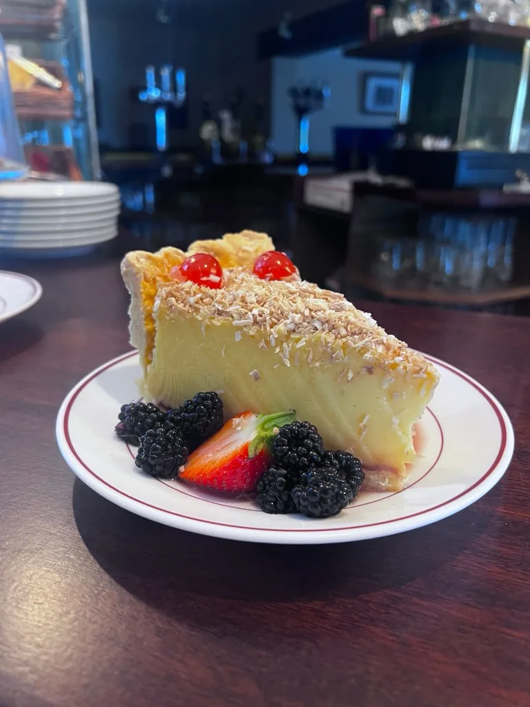 Coconut custard tart with fresh berries