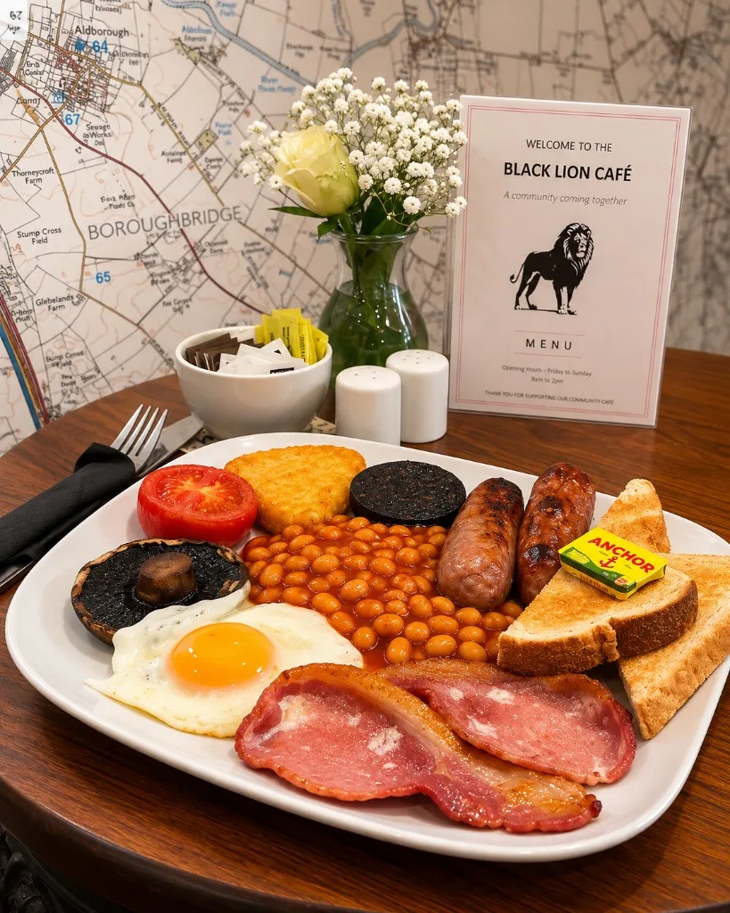 Full English breakfast beside the map wallpaper