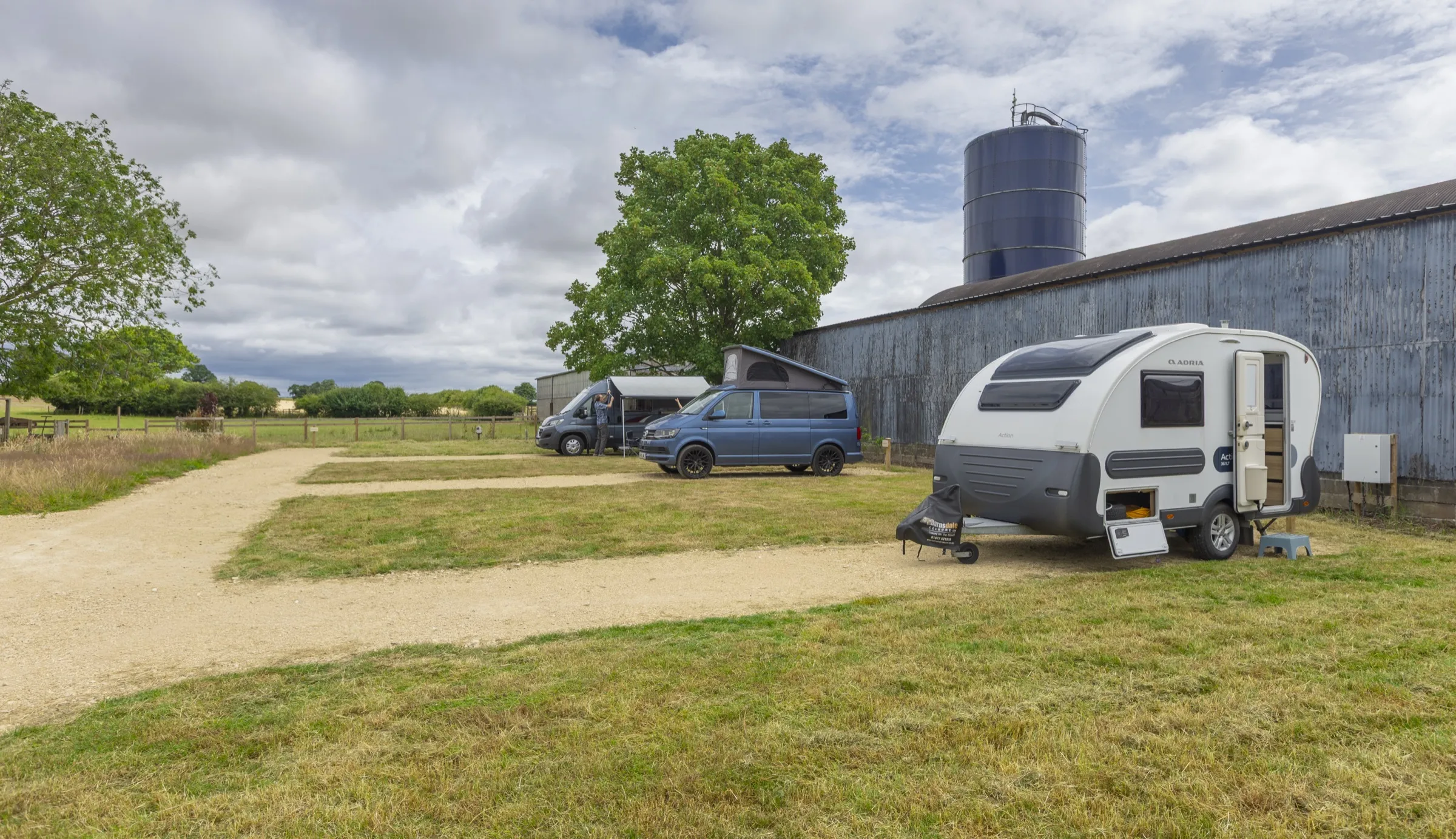 Motorhome, campervan and touring caravan on the gravel pitches