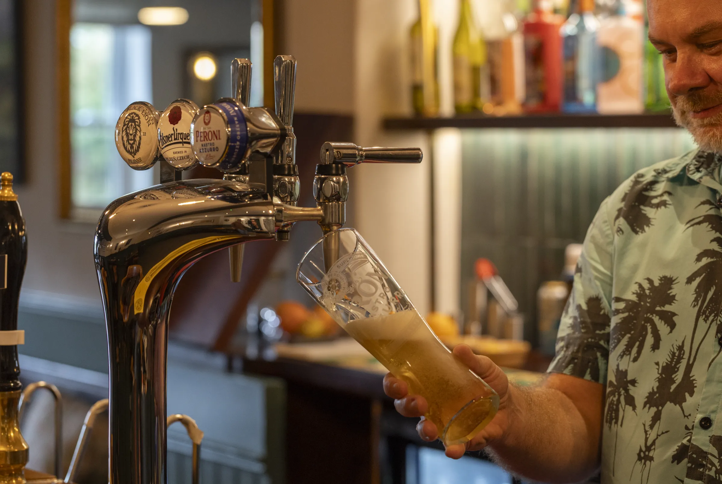 A pint being poured from the Black Lion taps during Mexican Night