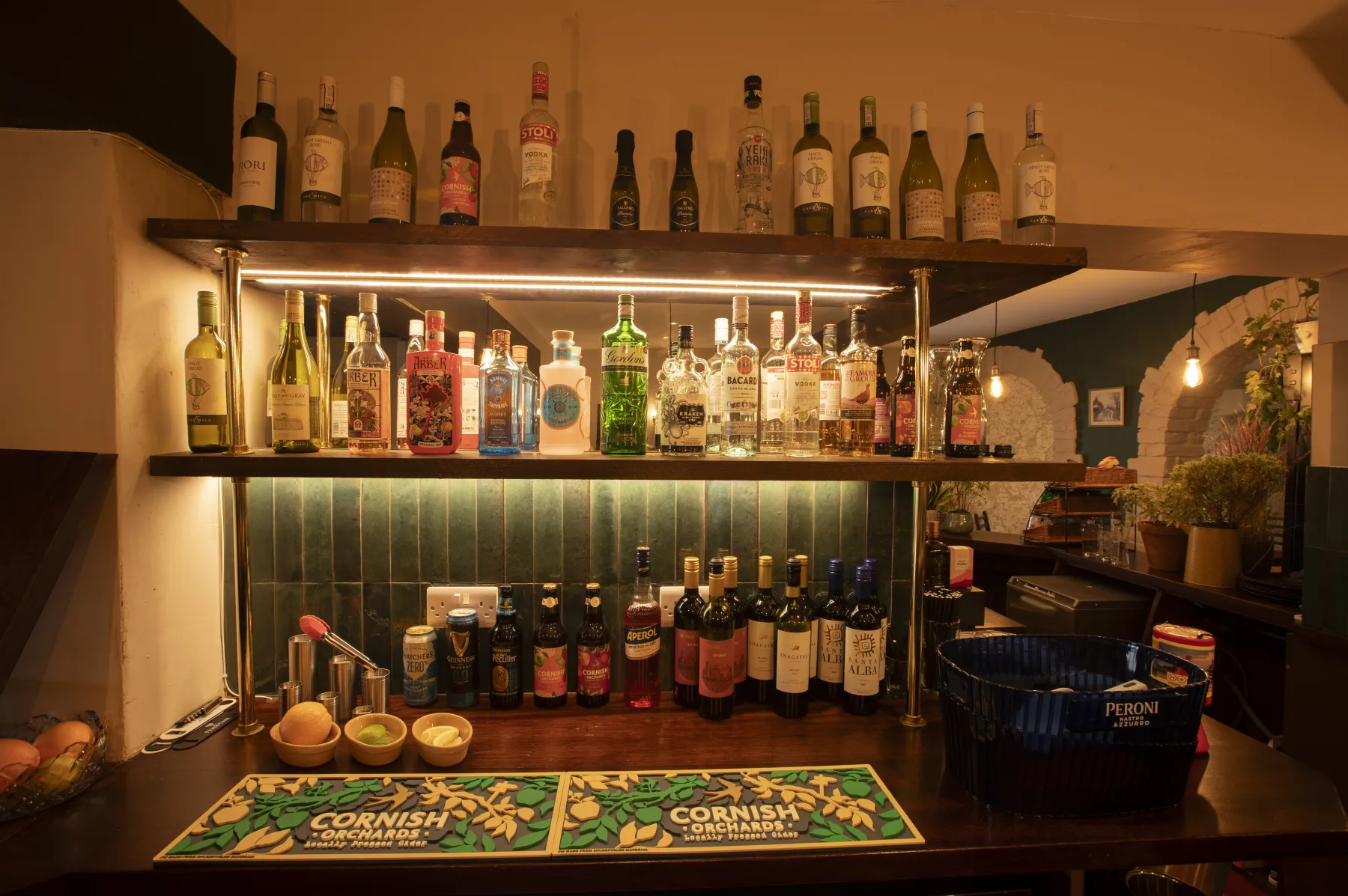 Wine, spirits and alcohol-free drinks displayed behind the bar