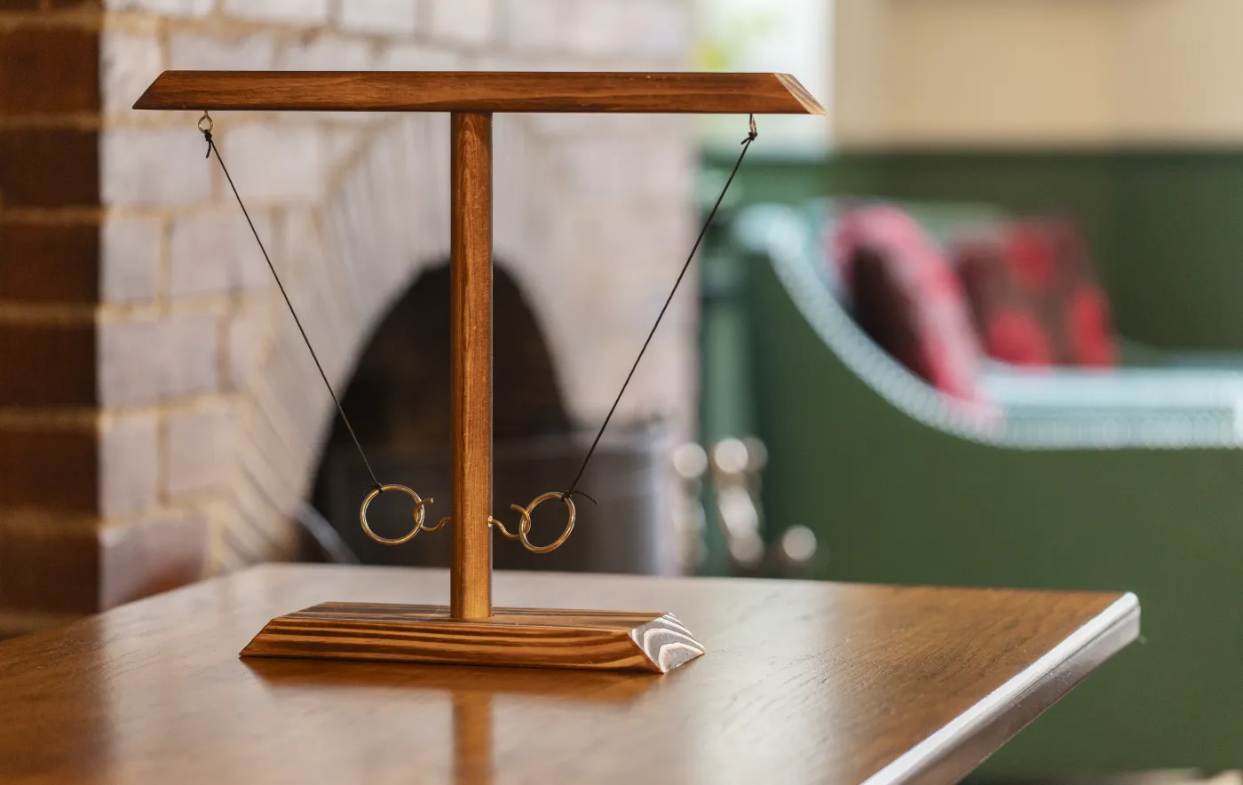 Traditional ring-on-a-hook tabletop game